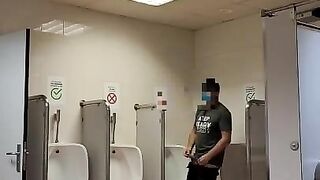 jerking off in a public toilet at Barcelona airport. almost caught by the cops. very hot risky