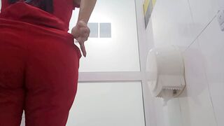 Pretty girl pissing in the bathroom of the clinic