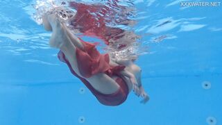 Hottest milf strips underwater