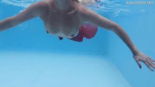 Hottest milf strips underwater