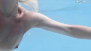 Hottest milf strips underwater