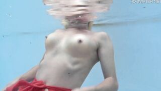 Hottest milf strips underwater