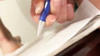 Arab writing the name with a pencil in the ass