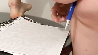 Arab writing the name with a pencil in the ass