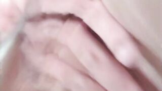 Big fat pussy slut masturbating in the bathtub and playing with her pussy under water, close up