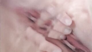 Big fat pussy slut masturbating in the bathtub and playing with her pussy under water, close up