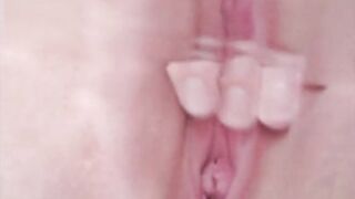 Big fat pussy slut masturbating in the bathtub and playing with her pussy under water, close up