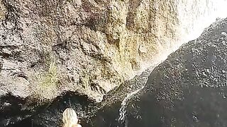 Naked beautiful girl under waterfall. Home video. Nudist wife.