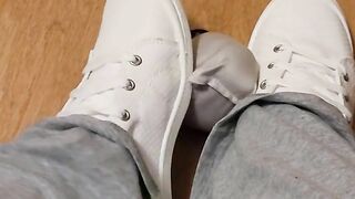 Rubbing his cock with white shoes