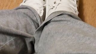 Rubbing his cock with white shoes