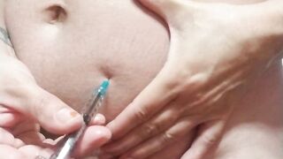 Ftm takes injection in cubby tummy