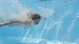 Finnish blonde tattooed pornstar Mimi underwater