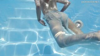 Finnish blonde tattooed pornstar Mimi underwater