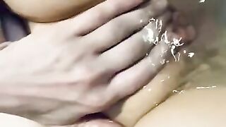 Pretty thick white girl playing with her pretty pink pussy in the bath tub