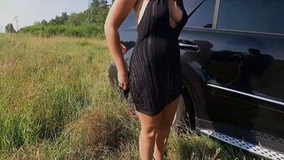 MILF relieves her bladder in a super sexy black dress outside, close up on her pierced clit