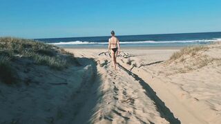 Hot Aussie babe stripping at a public beach