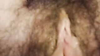 Masturbating to beautiful music. Hairy pussy. Clit closeup, winking ass.